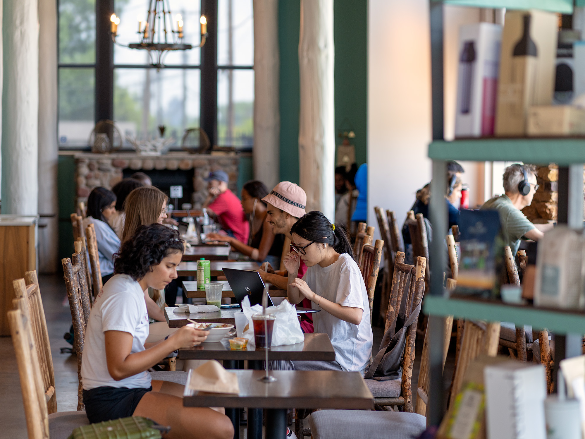 Guests waiting at the counter of Skinker cafe